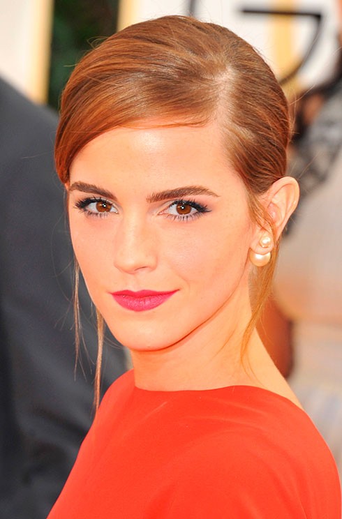 Emma Watson at the 2014 Emmy Awards wearing Dior's Mise En Dior Tribal Earrings
