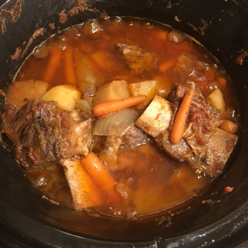 Barbecue Beef Short Ribs Cooking in Slow Cooker