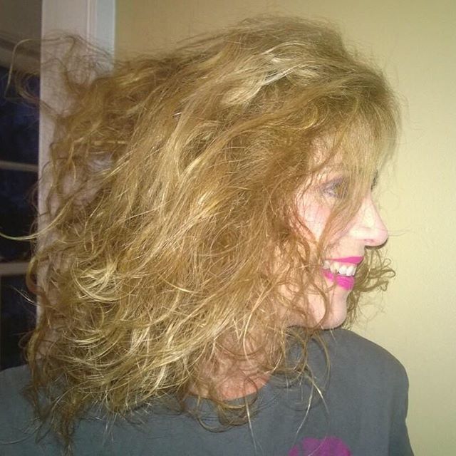 teasied hair 80s style with extra hold hairspray