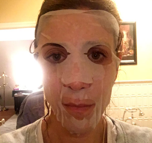 Proof that I am willing to embarrass myself, here I am with a single use sheet mask. You leave it on for about 15-20 minutes (and scare the crap out of your family) until the ingredients soak into your skin and the sheet is nearly dry. My skin was freaking fabulous when I took it off! Snail goo is GOD.