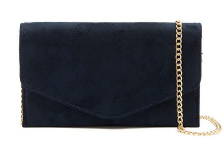 Mila Kunis suiting look for less handbag