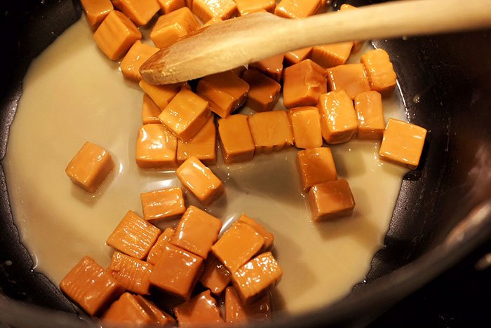 salted caramel apples recipe melting caramels on stove