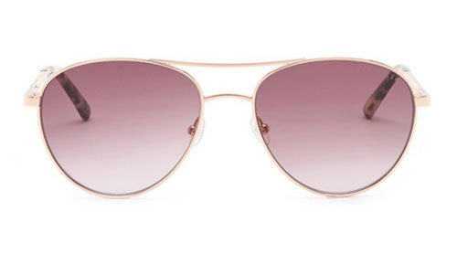 Kerry Washington cozy pastel look rose sunglasses