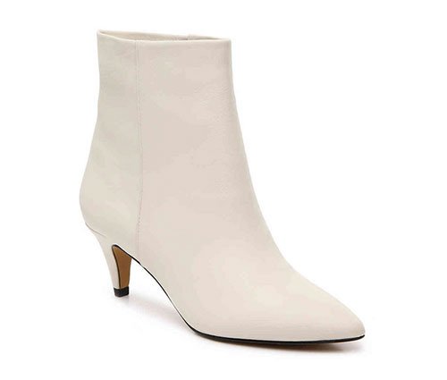 Kerry Washington cozy pastel look winter white boot