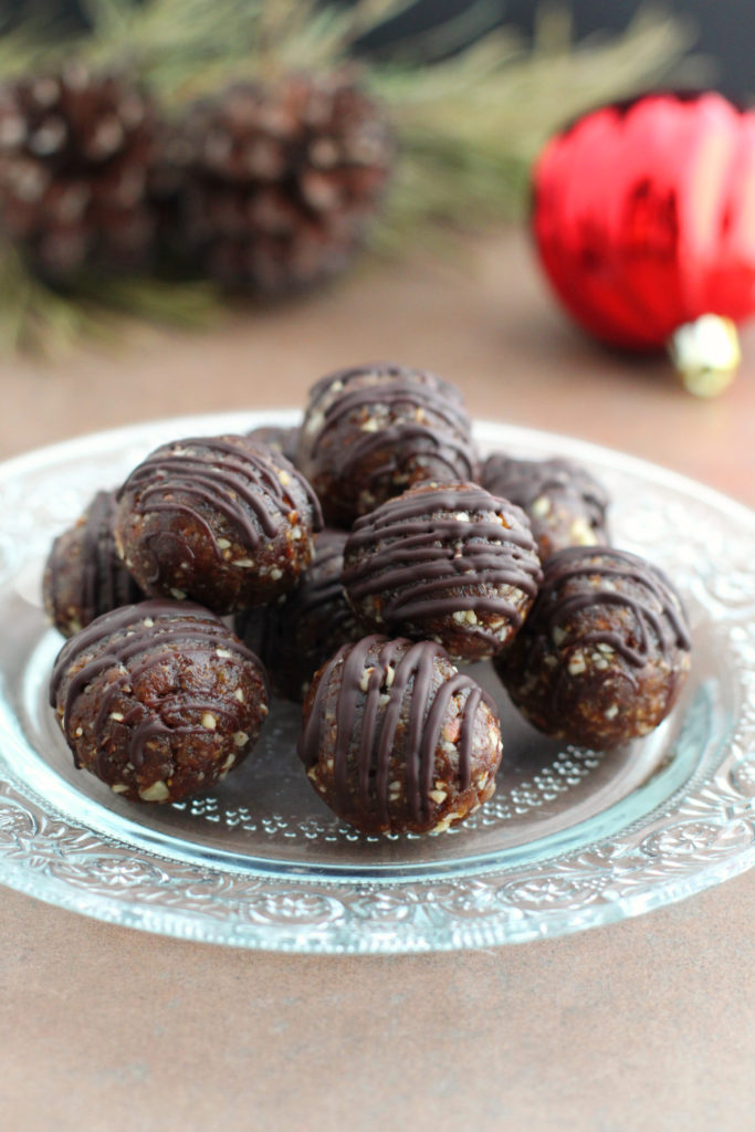 Gingerbread Energy Bites on a glass Plate