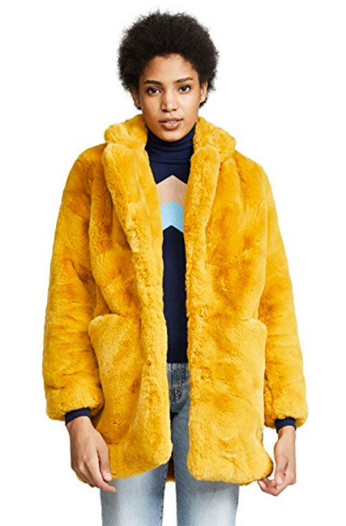 Sandra Bullock look for less mustard yellow fur coat