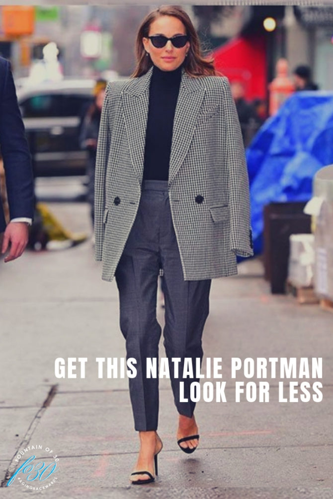 Natalie Portman look for less walking down a city street wearing a houndstooth jacket and charcoal grey trousers.