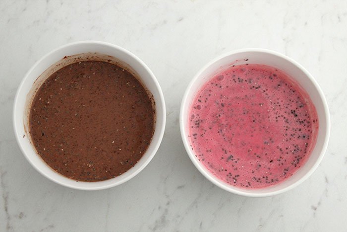 puddings Chilled Chocolate in white bowl and  and Raspberry Chia in white bowl