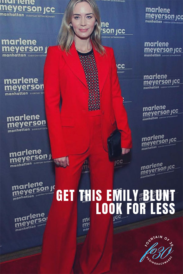Emily Blunt in a red jacket and wide leg pants on the red carpet marlene meyerson