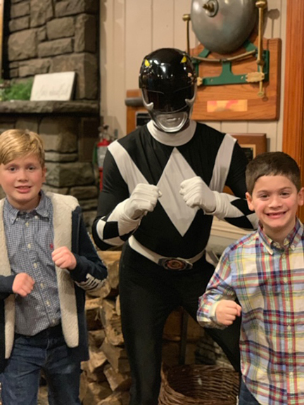 two boys with Power Ranger in black