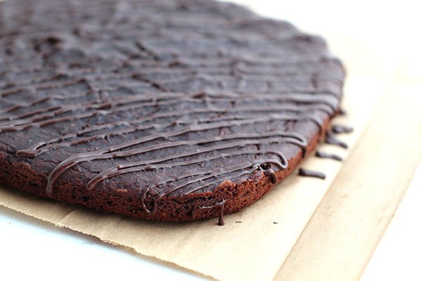 Dark Chocolate Zucchini Brownies drizzed with chocoalte