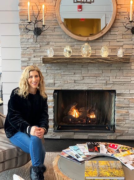 woman in lounge at the Lodge at Wooodloch Spa