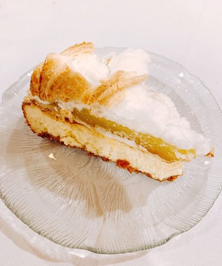 Lemon meringue cheesecake on a plate