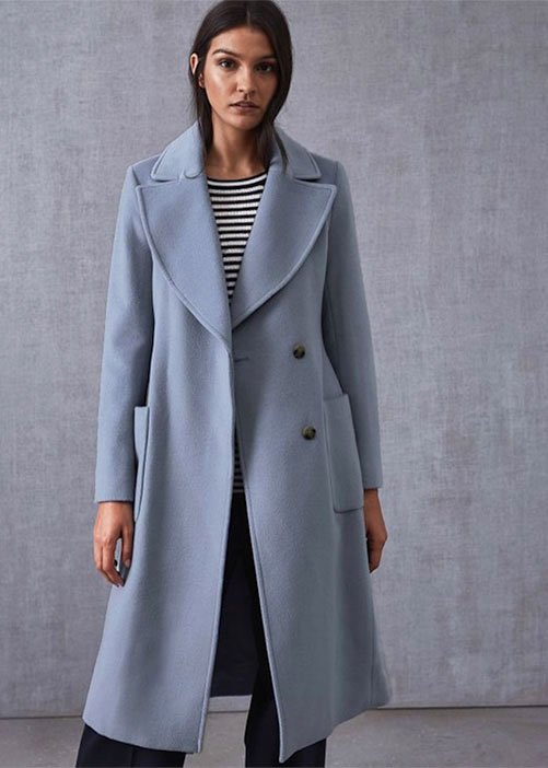 light blue wool Reiaa overcoat on brunette model stripe top