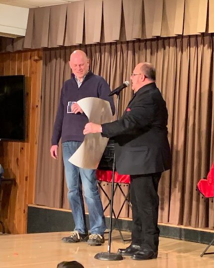 man on stage during magic show