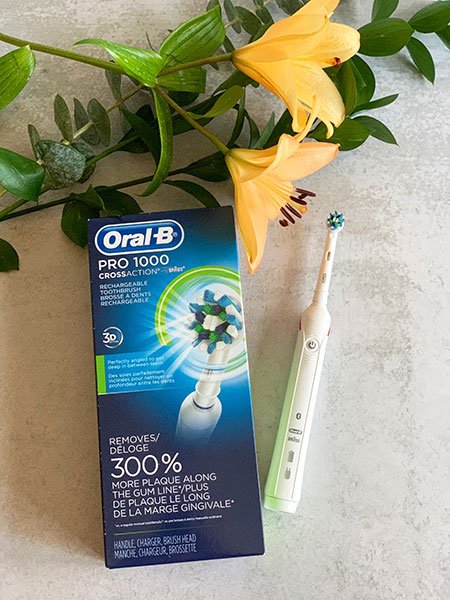  Oral-B Pro 1000 power toothbrush blus ebox and yellow florals