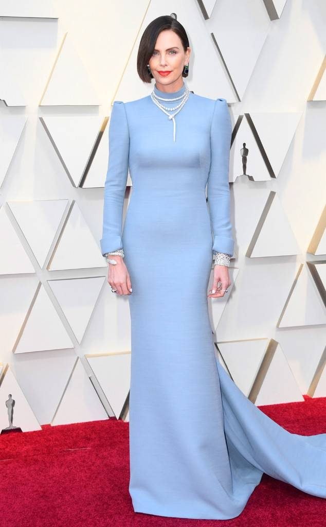 Charlize Theron in light blue long sleeve Christian Dior gown 2019 Oscars red carpet