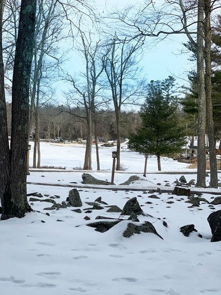 A view of the frozen lake at Woodloch Pines Resort