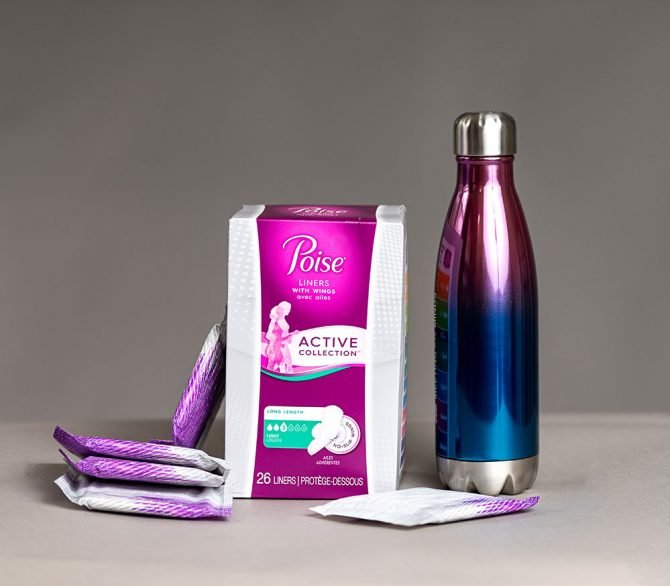 Poise Active Incontinence Pads product box packets with water bottle
