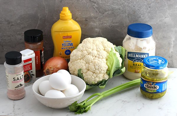 low carb cauliflower potato salad recipe ingredients on a marble table