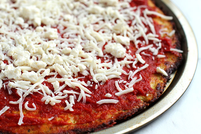 Cauliflower Pizza tomato and cheese topping on crust fountainof30