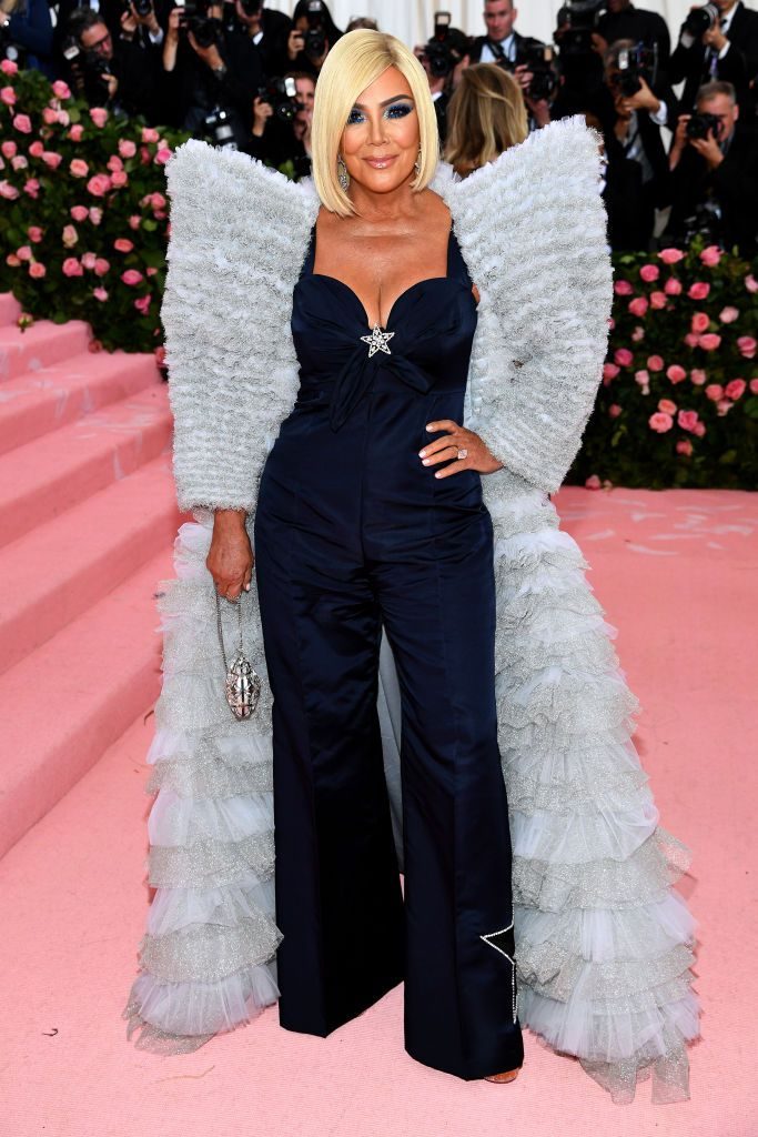 met gala 2019 Kris Jenner blond in Tommy Hilfiger navy jumpsuit