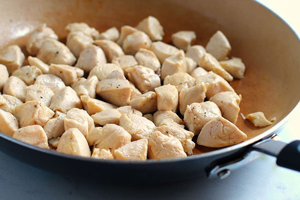 lemon chicken cooking in a fry pan fountainof30