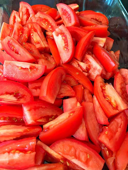 fresh tomatoes in a baking pan fountainof30