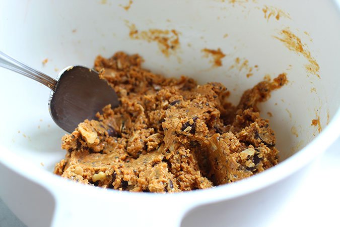 Peanut Butter Protein Bites mixing with spoon fountainof30