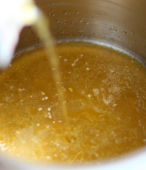 creamy roasted cauliflower soup recipe creamy roasted cauliflower soup vegetable broth into soup pot