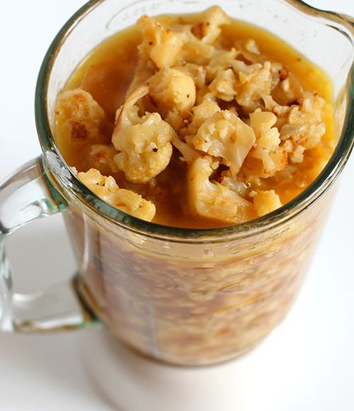 creamy roasted cauliflower soup in a blender transfer to a blender fountainof30
