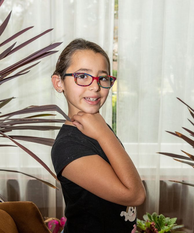 young girl with cochlear implants