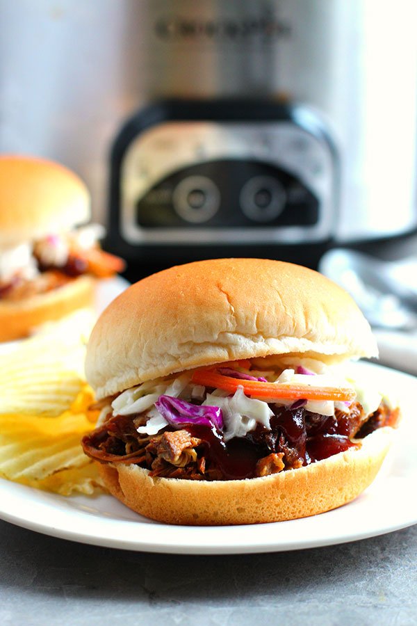 Texas-Style Crock-Pot Pulled Pork bun with cole slaw fountainof30