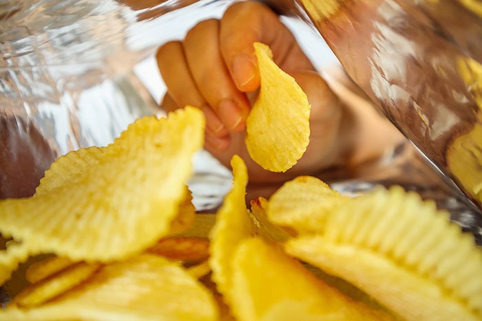 diet tips food choices potato chips hand in the bag fountainof30