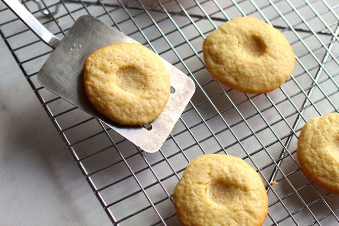 thumbprint cookies on a rack fountainof30