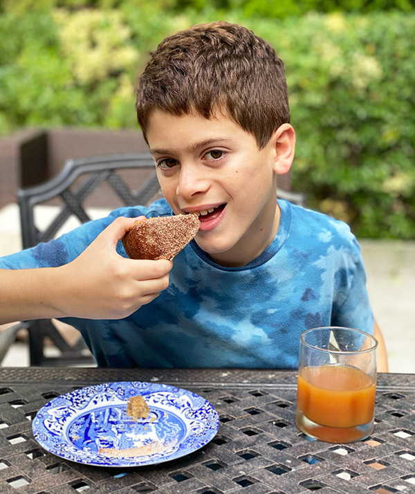 boy eating Apple Cider Cake fountainof30