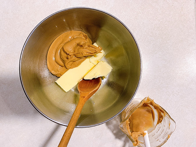 Cream butter and peanut butter.
