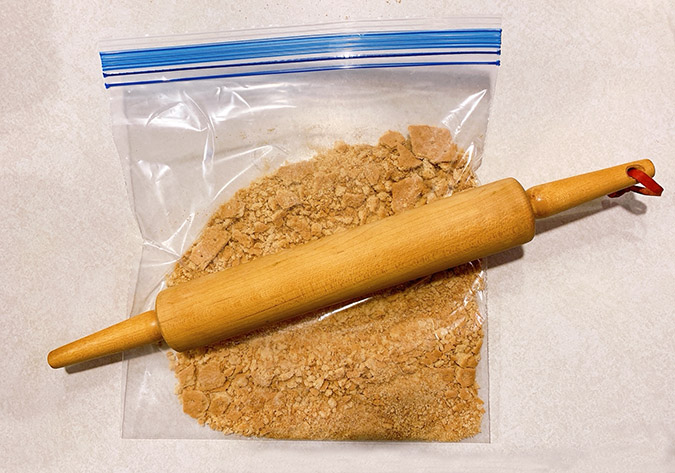 Make your own graham cracket crumbs by rolling in a large bag.