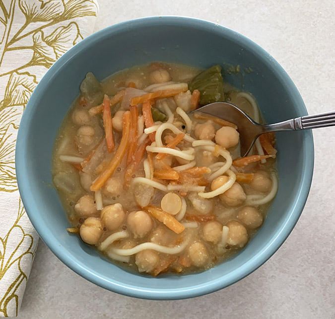 hearty chickpea soup serving in a bowl fountainof30