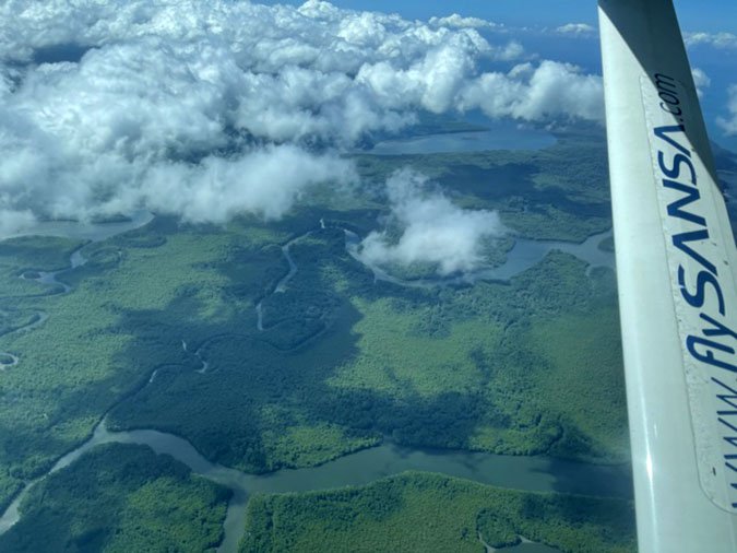 travel to Osa Peninsula plane landing fountainof30