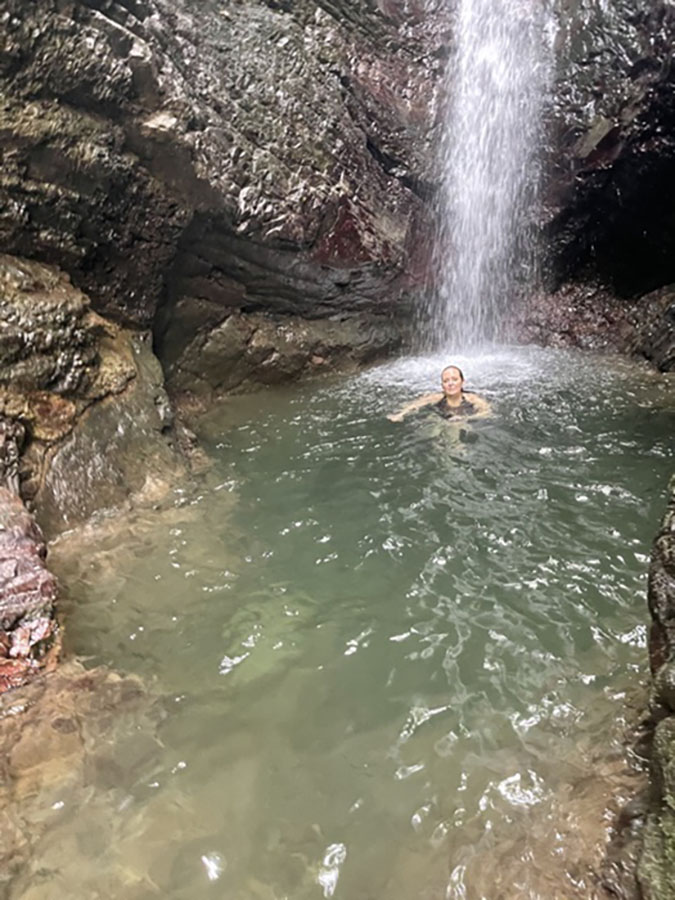 Pacuare River swimming in waterfall fountainof30