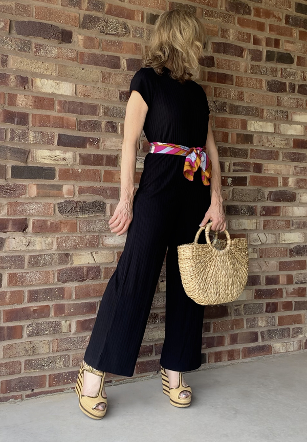 black jumpsuit outfit straw bag fountainof30