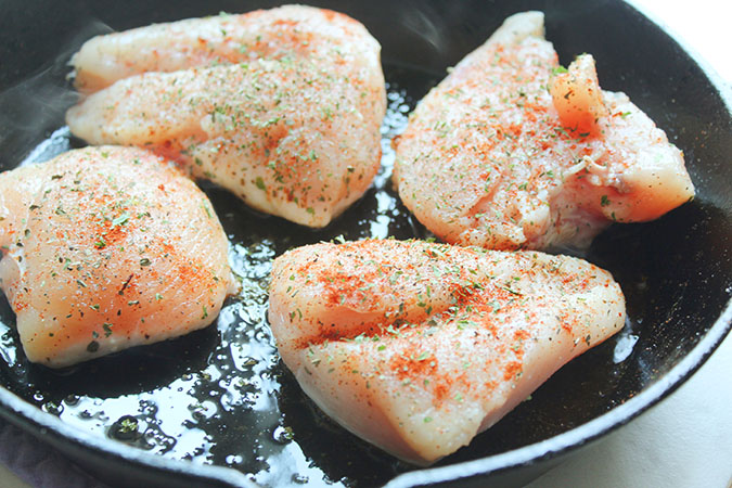 garlic butter chicken seasoned in a skillet fountainof30