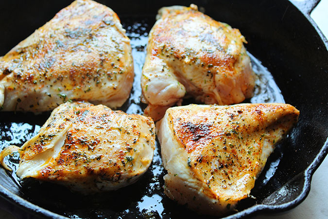 garlic butter chicken brownd in skillet