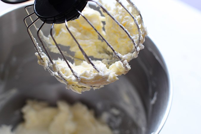 frosting on beater in bowl fountainof30