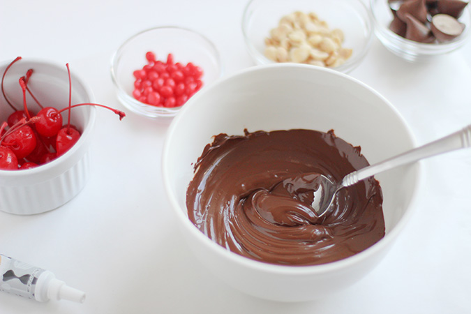 ingredients and melted chocolate chips in a bowl fountainof30