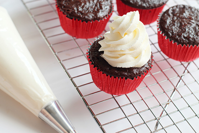 Piped frosting on hot cocao cupcake fountainof30