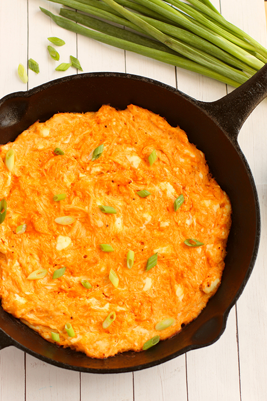 Buffalo Chicken Dip in skillet with chilves fountainof30