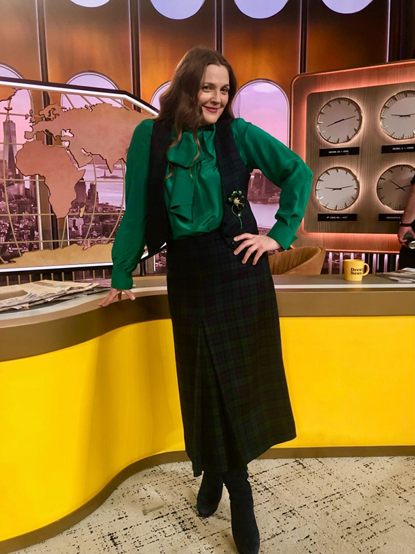 Drew Barrymore green shirt black skirt and vest