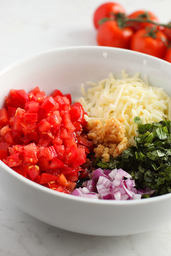 bruschetta ingredients in a bowl fountainof30